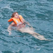 Figure 1: A person floating with the life jacket on